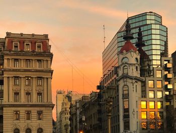 View of buildings in city against sky