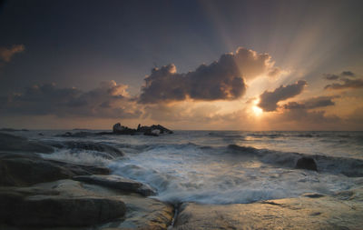 Scenic view of sea against sky during sunset