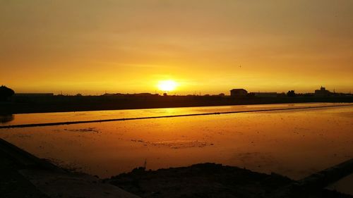 Scenic view of sunset over sea