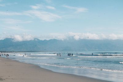 Scenic view of beach against sky