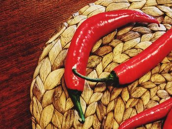 High angle view of red chili pepper on table