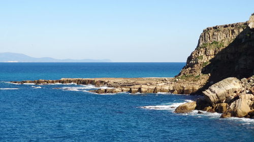 Scenic view of sea against clear sky