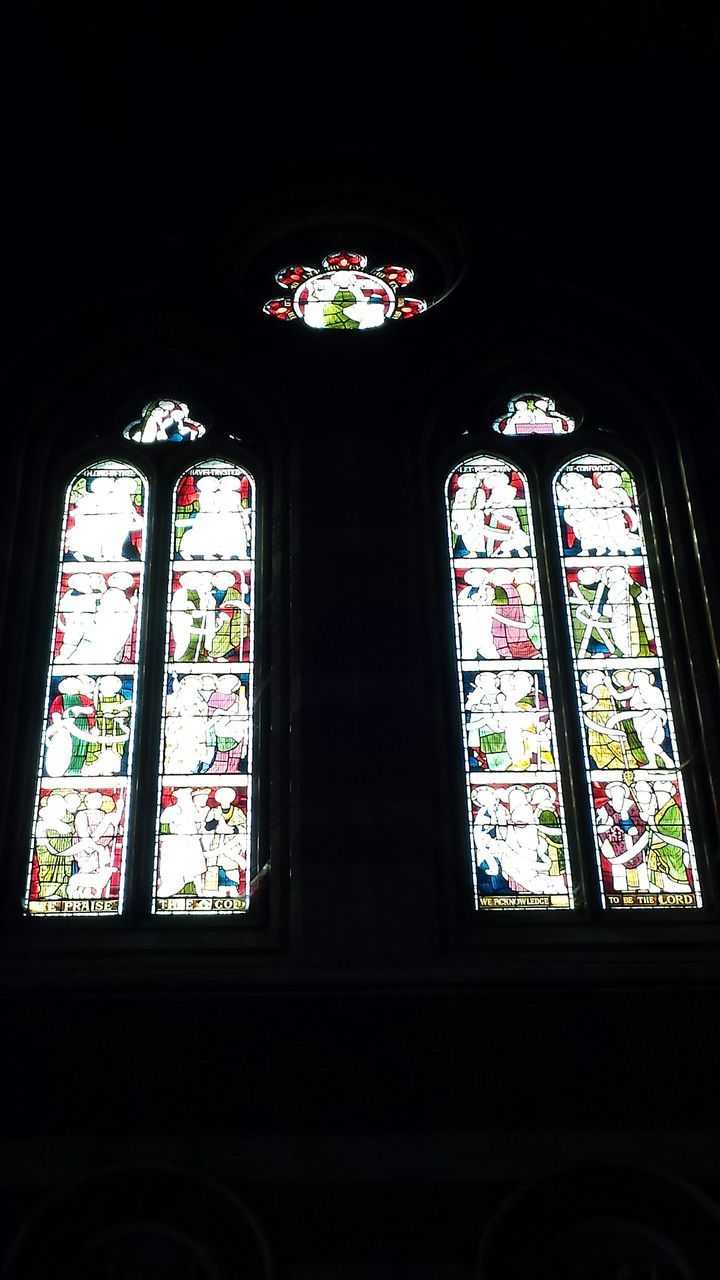 indoors, window, religion, church, place of worship, glass - material, stained glass, architecture, arch, built structure, spirituality, multi colored, transparent, interior, low angle view, ornate, design, ceiling