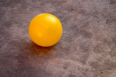 High angle view of yellow lemon on table