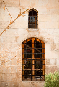 Low angle view of old building window