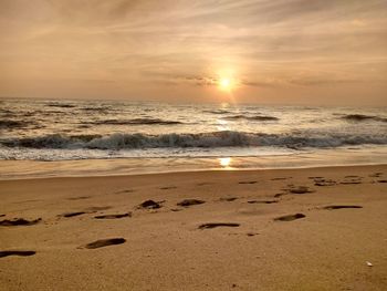 Scenic view of sea at sunset