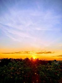 Scenic view of landscape against sky during sunset