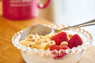 Close-up of strawberries in bowl on table