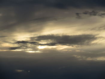 Low angle view of cloudy sky during sunset