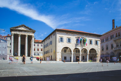 Group of people in front of building