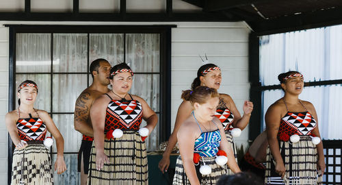 Group of people looking at store