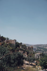 High angle view of buildings against clear sky