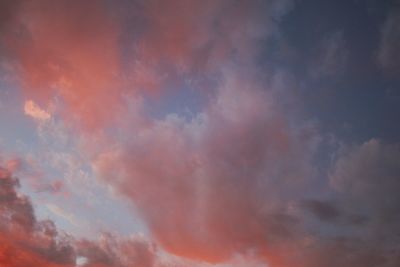 Low angle view of dramatic sky during sunset