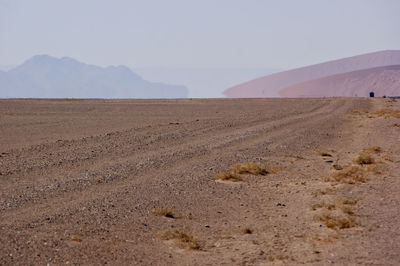 Scenic view of desert against sky