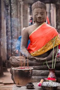 Close-up of statue against temple