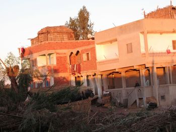 Old buildings against clear sky