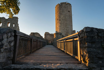 Scenic view of bridge to castle ruin wolfstein at neumarkt, sunset evening in summer