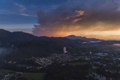 High angle view of townscape against sky during sunset