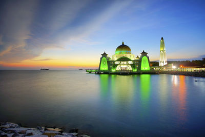 View of mosque at sunset