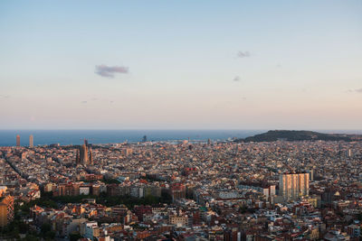 High angle view of barcelona at sunset