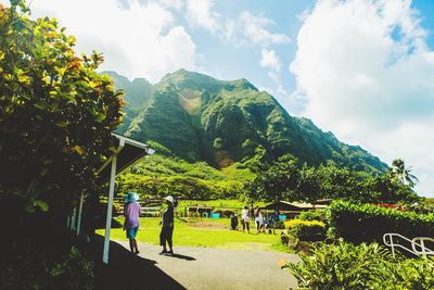 Scenic view of mountains against cloudy sky