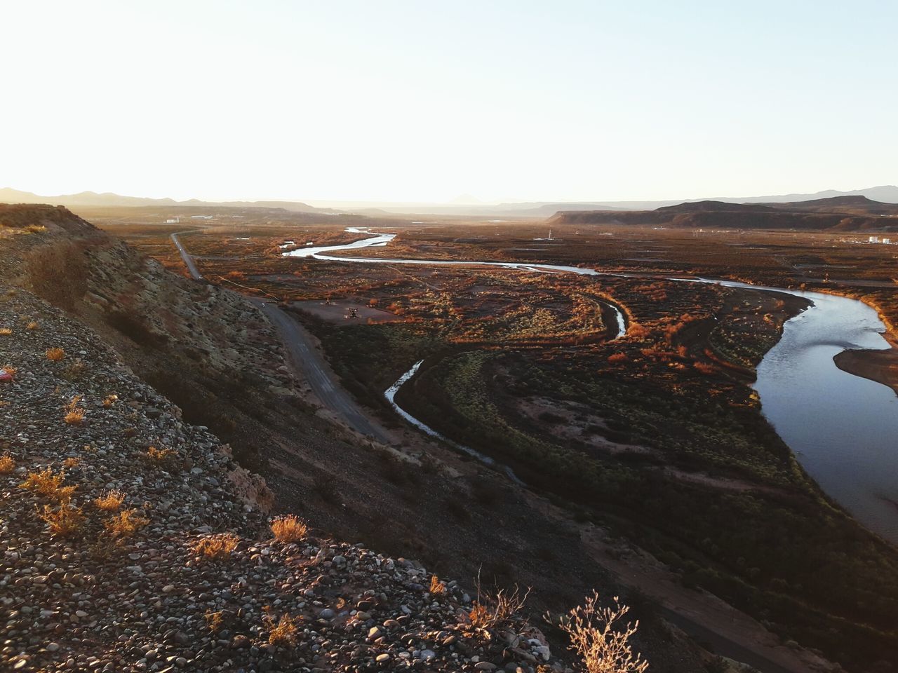 HIGH ANGLE VIEW OF WINDING ROAD