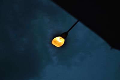 Low angle view of lemon slice against sky