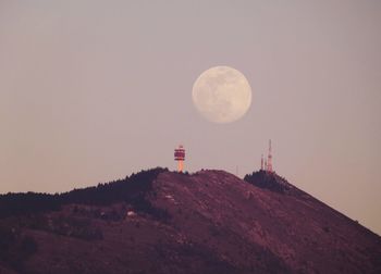 Scenic view of moon against sky at dusk