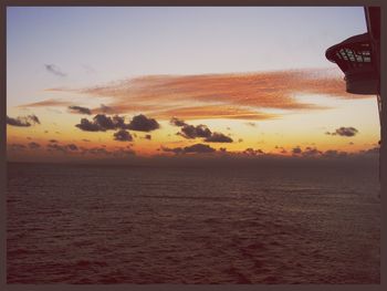 Scenic view of sea at sunset