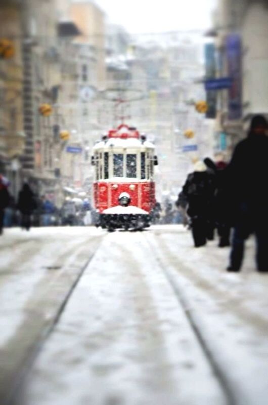 building exterior, architecture, built structure, focus on foreground, red, selective focus, incidental people, street, city, walking, day, city life, men, outdoors, person, winter, large group of people, lifestyles