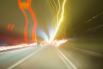 Light trails on road at night