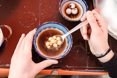 Close-up of hand holding food