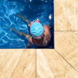 High angle view of person in swimming in pool