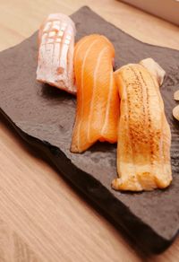High angle view of bread on cutting board