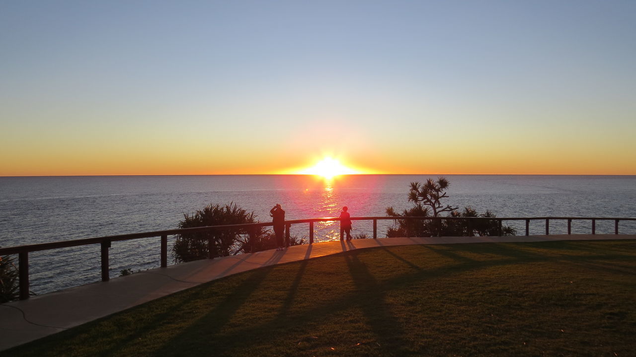 sunset, sun, water, sea, horizon over water, tranquil scene, scenics, tranquility, beauty in nature, idyllic, nature, sunlight, orange color, sky, lens flare, sunbeam, remote, outdoors, calm, ocean, vacations, non-urban scene, tourism, travel destinations, bright, rippled