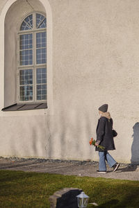 Woman in churchyard