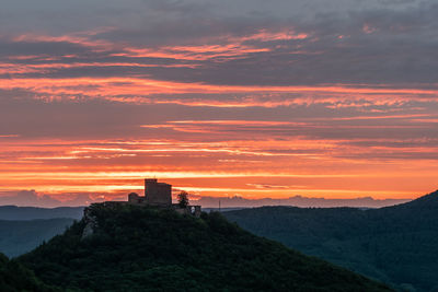 Scenic view of sunset over mountain