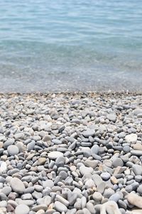 High angle view of pebbles on beach