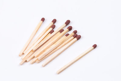 High angle view of objects against white background