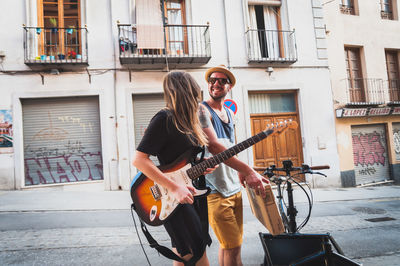 Couple standing on street 