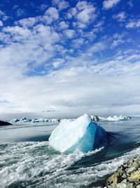 Scenic view of frozen sea against sky