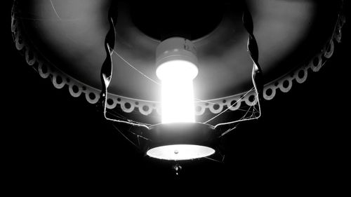 Low angle view of illuminated light bulb