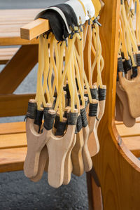 Close-up of clothes hanging on wood