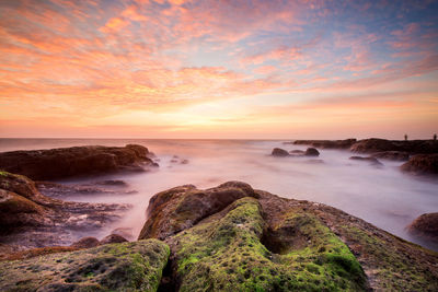 Scenic view of sea against sky during sunset