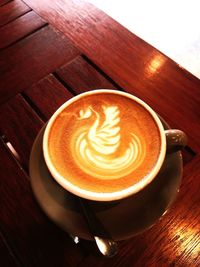 Close-up of cappuccino on table