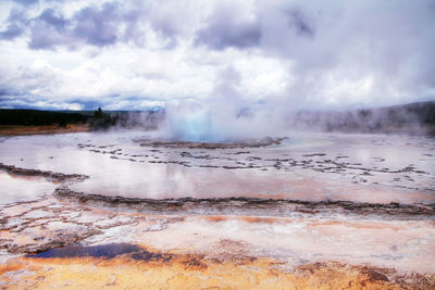 View of hot spring against sky