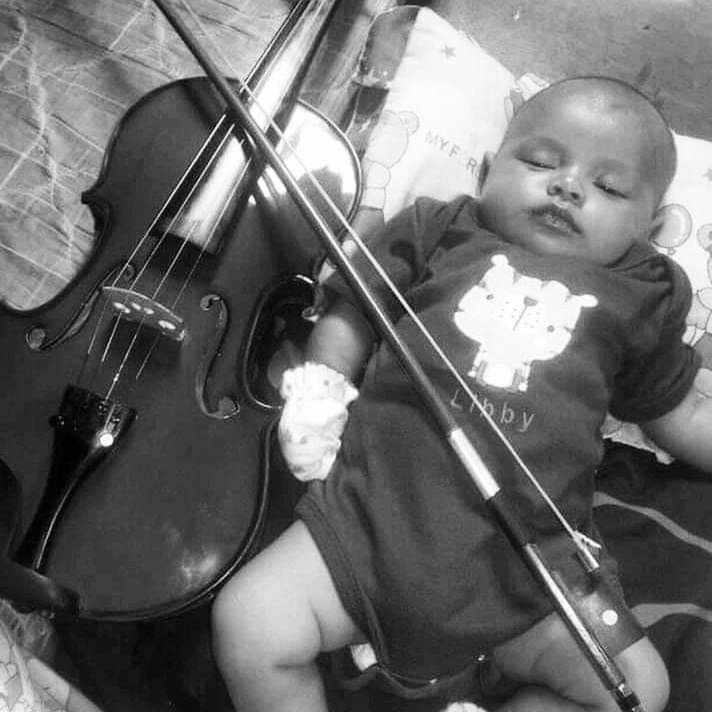 musical instrument, music, string instrument, arts culture and entertainment, musician, violin, musical equipment, bowed string instrument, violinist, cello, black and white, fiddle, men, performance, monochrome photography, one person, classical music, monochrome, child, adult, skill, person, bass guitar, bow - musical equipment, viola, childhood, indoors, musical instrument string, string, high angle view