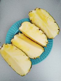 High angle view of lemon slice in plate on table