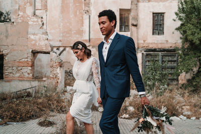 Young couple standing outdoors