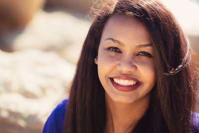 Portrait of smiling young woman